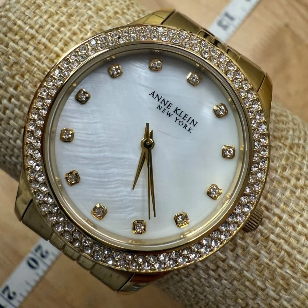 Anne Klein New York Womens Gold-Tone Watch With Crystal Accents & Mother-Of-Pear
